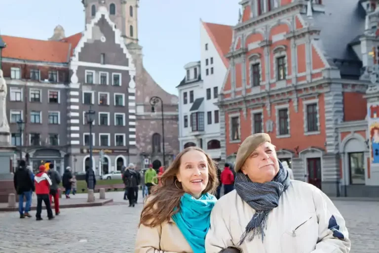 Tourist couple in the old town of Riga in Latvia